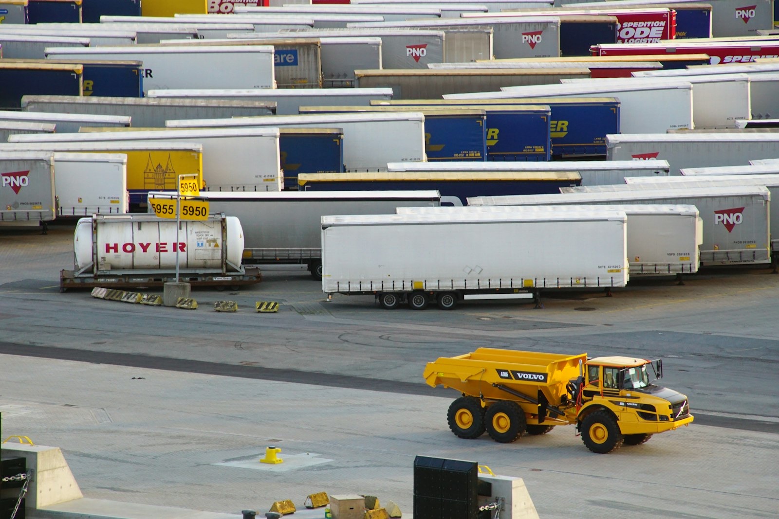 Trailer yard with parked trailers and site equipment