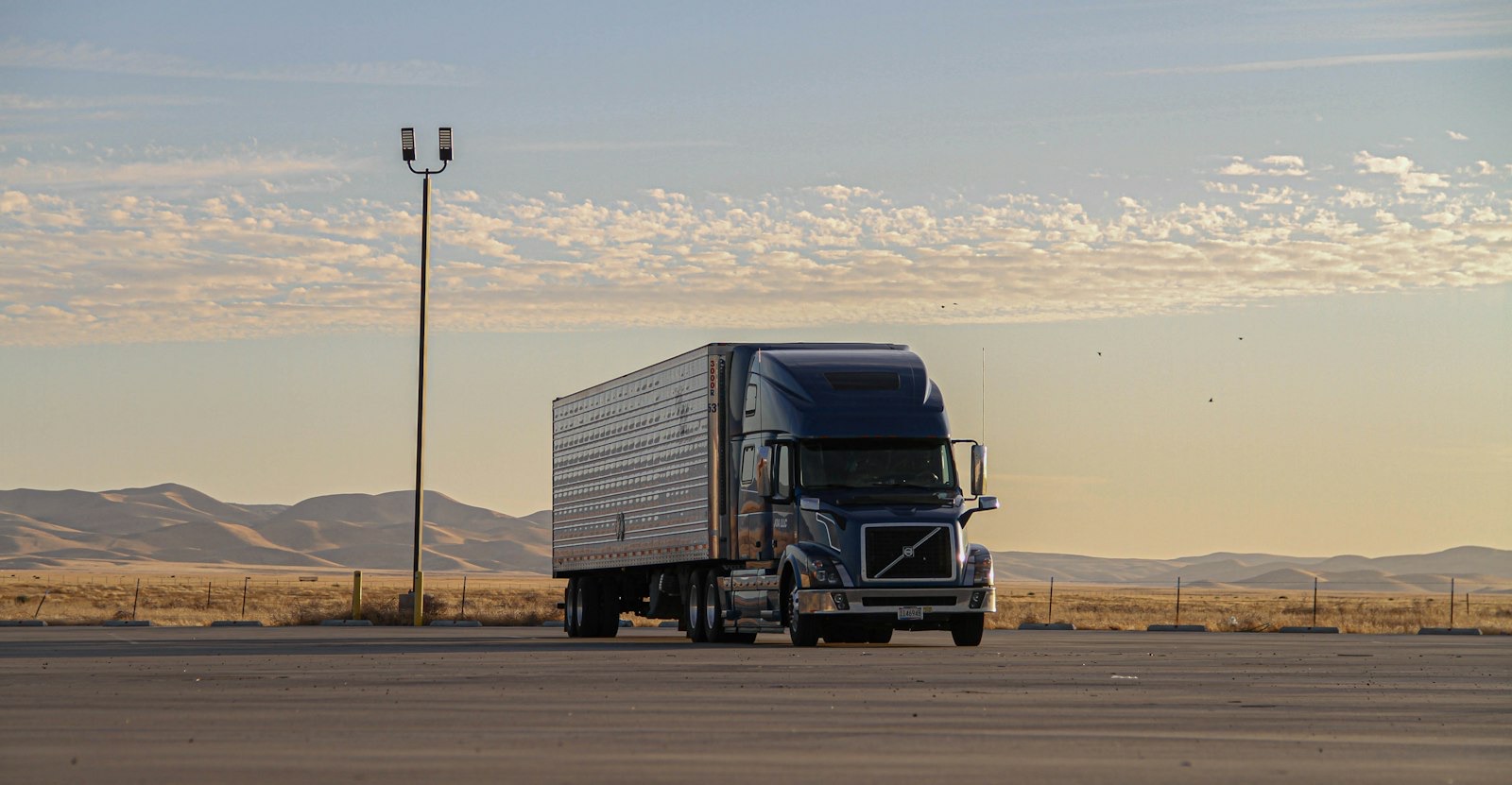 Trucks parked on an outdoor lot